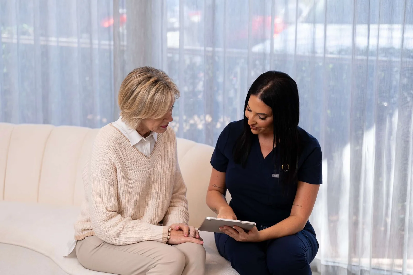 A team member talking through a consultation with a client